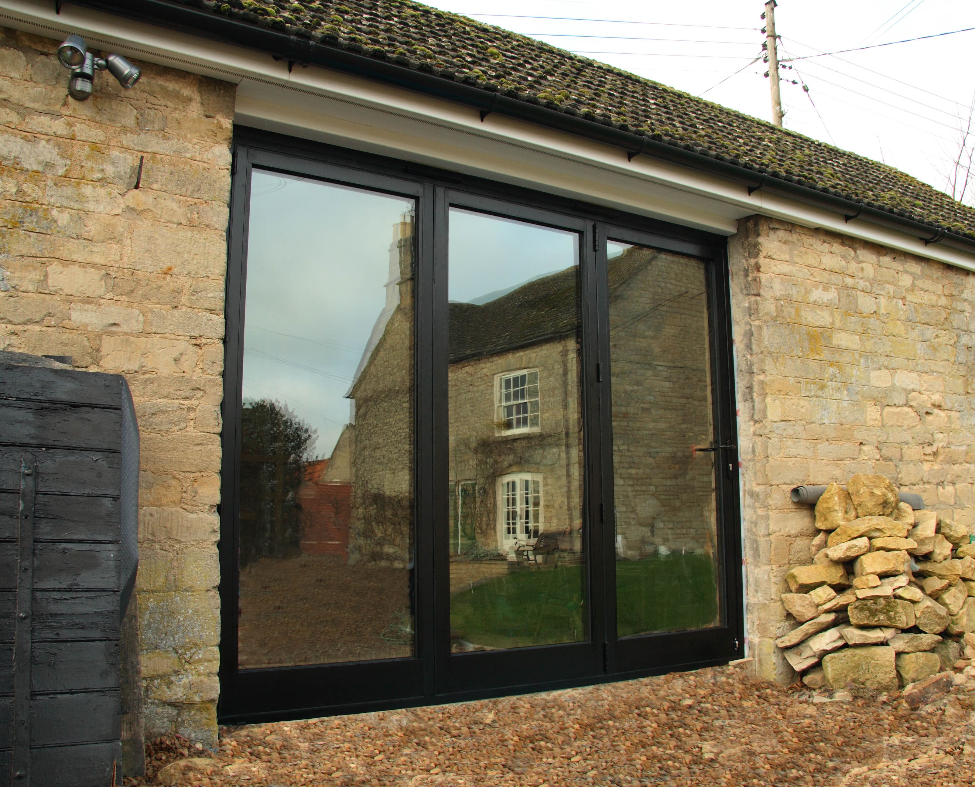 Bespoke Aluminium Bi-Fold doors Windsor